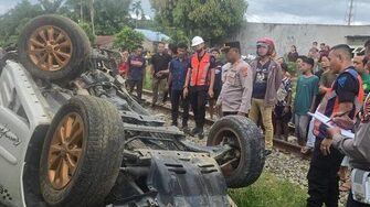 mobil-tabrakan-dengan-kereta-di-asahan-medan-1742745505061_169