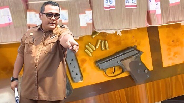 ilustrasi-Topan-Ginting-dan-senjata-Beretta